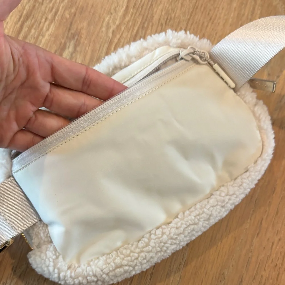 lululemon athletica Cream Sherpa Waist Bag with Gold Hardware